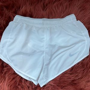 White Nike shorts